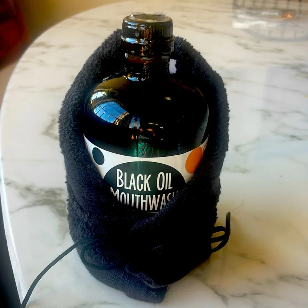 Black Oil Mouthwash is the world’s first and only of its kind. With washcloth